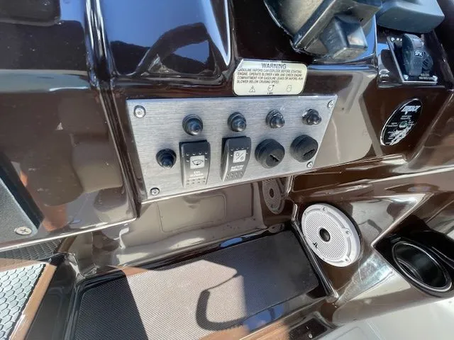 Slide: The Image of Dashboard of a 2014 Regal 3550 Cuddy boat. - 32