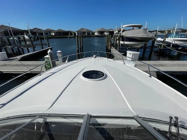 Slide: The Image of 2014 Regal 3550 Cuddy at dock under clear sky. - 35