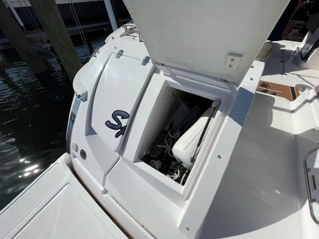 Slide: The Image of 2014 Regal 3550 Cuddy with open rear storage compartment. - 8