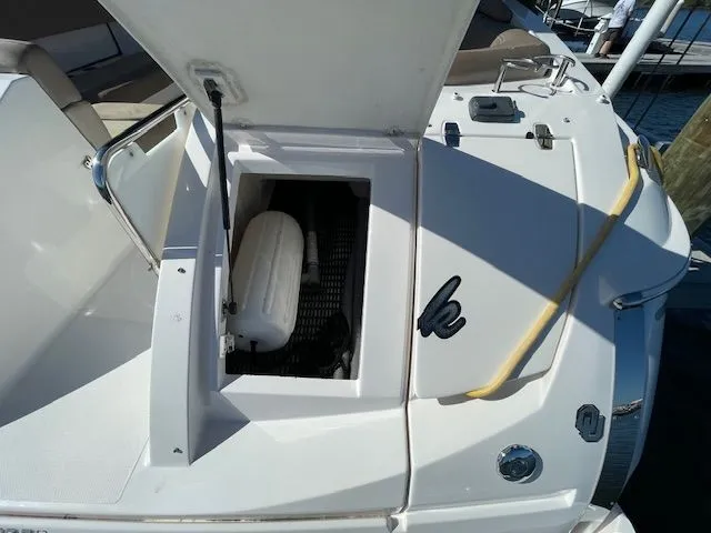 Slide: The Image of Regal 3550 Cuddy 2014 boat with open storage compartment. - 9