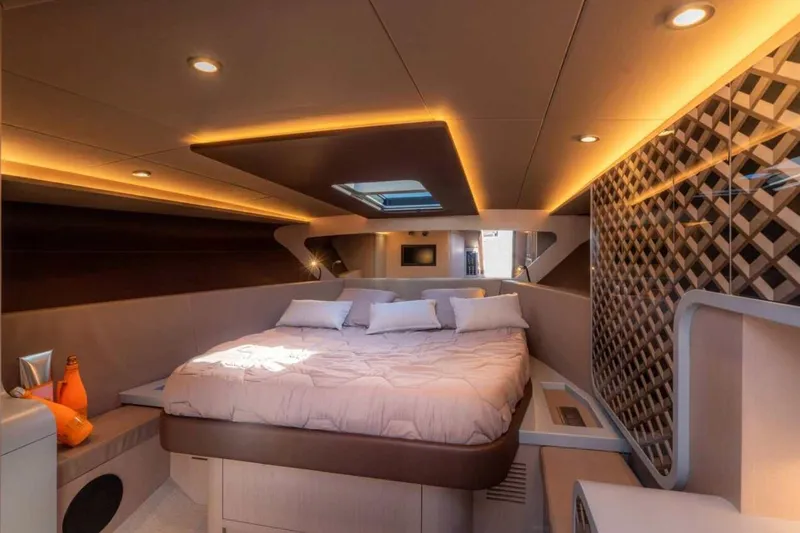 Slide: The Image of Luxurious bedroom in Canados 431 Speedster 2026 yacht interior. - 6