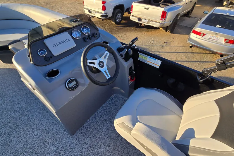 Slide: The Image of 2023 Veranda Vista View 20RC boat dashboard with Garmin navigation system. - 14