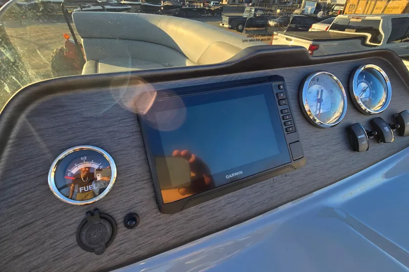 Slide: The Image of 2023 Veranda Vista View 20RC dashboard with Garmin display and gauges. - 17