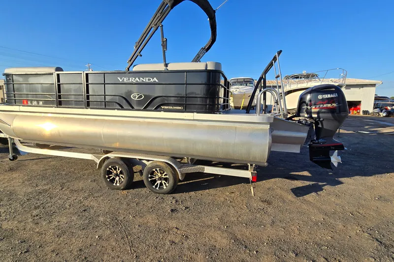 Slide: The Image of 2023 Veranda Vista View 20RC pontoon boat with Yamaha outboard motor on trailer. - 3