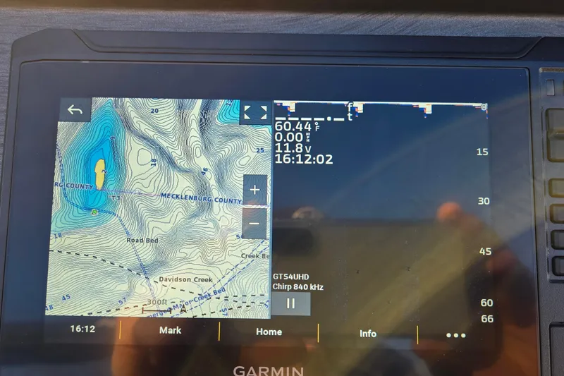 Slide: The Image of Garmin GPS display on 2023 Veranda Vista View 20RC, showing Mecklenburg County map and data. - 33
