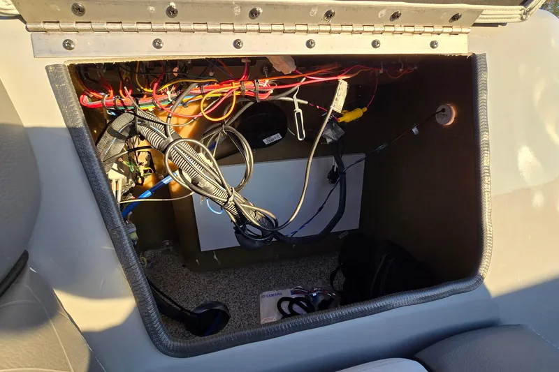 Slide: The Image of Electrical compartment of a 2023 Veranda Vista View 20RC boat. - 37