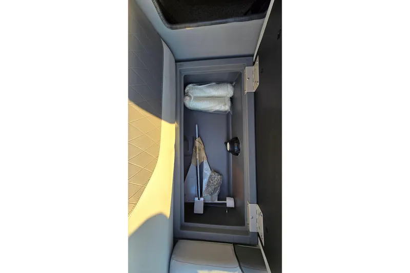 Slide: The Image of Storage compartment in 2023 Veranda Vista View 20RC, containing tools and accessories. - 38