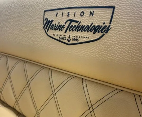 Slide: The Image of 2024 Vision Marine Technologies Fantail 217 boat seat with logo and stitching detail. - 5