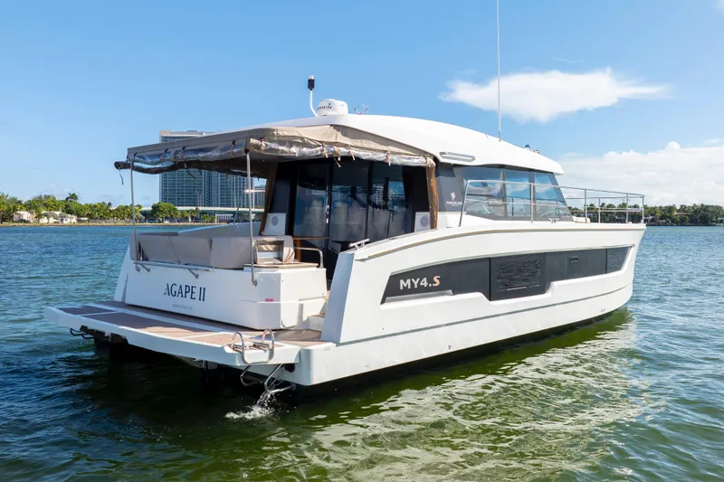 Slide: The Image of 2023 Fountaine Pajot MY4.S yacht on water, rear view, sunny day. - 13