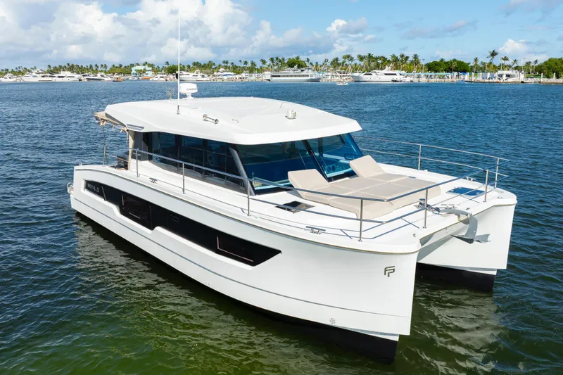 Slide: The Image of 2023 Fountaine Pajot MY4.S catamaran on calm water, showcasing sleek design and luxury features. - 4