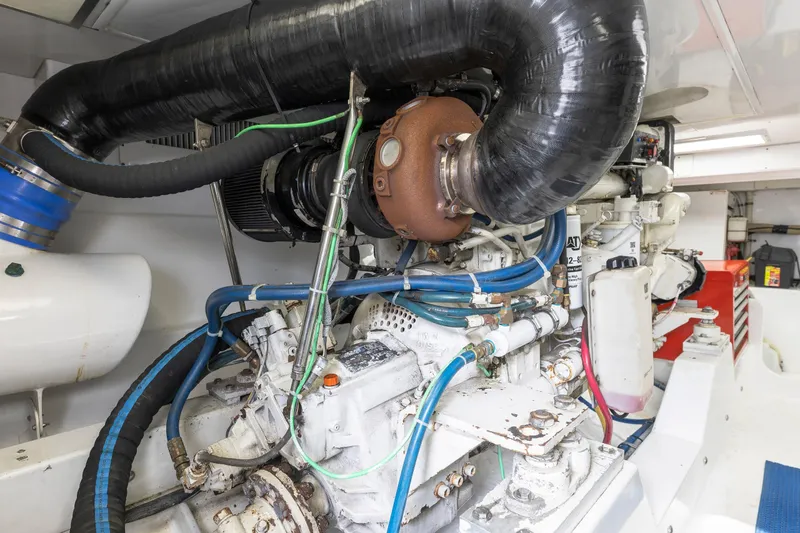 Slide: The Image of Sportfishing yacht Weaver 61, 2005 model, cruising on open water. - 17