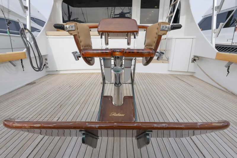 Slide: The Image of Luxury Weaver 61 yacht deck with polished wood chair, 2005 model. - 50