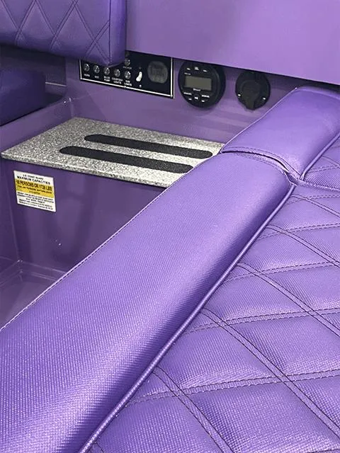 Slide: The Image of Purple interior of 2023 Vision Marine Technologies Fantail 217 boat with control panel. - 4