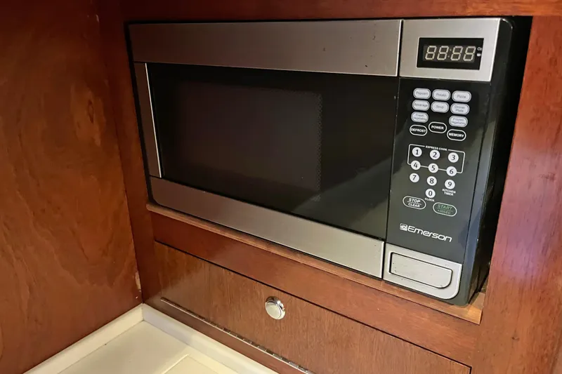Slide: The Image of Microwave oven in wooden cabinet on 1979 Amel Mango boat. - 34
