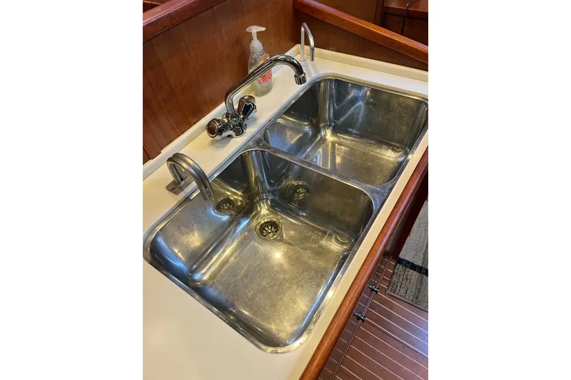 Slide: The Image of Stainless steel double sink in 1979 Amel Mango yacht kitchen. - 36