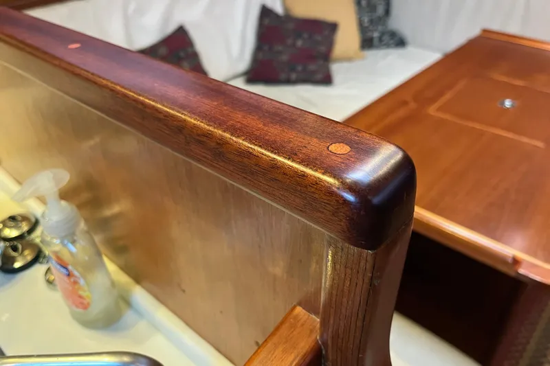 Slide: The Image of Polished wooden interior of 1979 Amel Mango yacht with cozy seating area. - 37