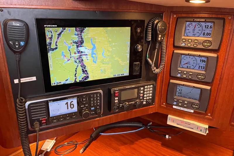 Slide: The Image of Navigation and communication equipment on a 1979 Amel Mango sailboat. - 45