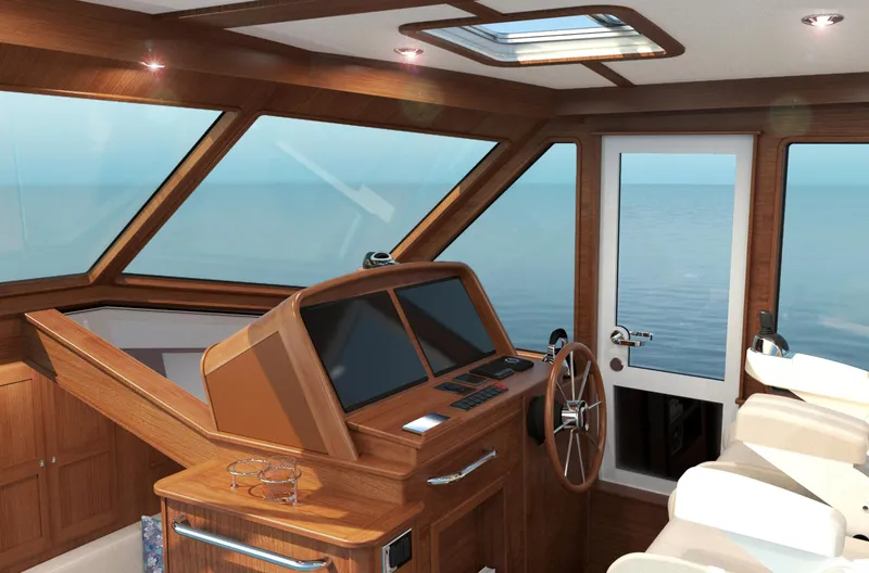 Slide: The Image of Interior of 2026 Sabre 43 Salon Express yacht with wooden helm and ocean view. - 17