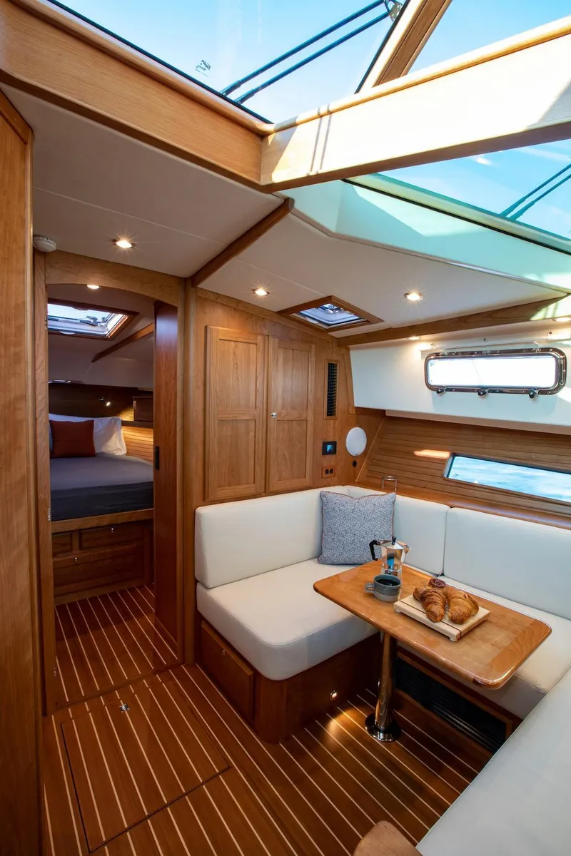 Slide: The Image of Luxurious interior of 2026 Sabre 43 Salon Express yacht with elegant wood finish. - 27