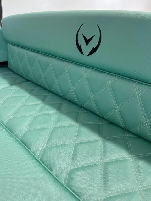 Slide: The Image of 2023 Vision Marine Technologies Fantail 217 boat seat with quilted turquoise upholstery. - 3