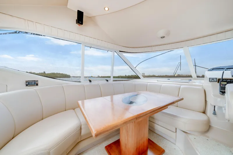 Slide: The Image of Luxurious interior of 2001 Cruisers Yachts 5000 Sedan Sport with panoramic windows. - 43