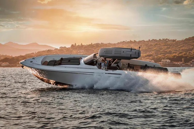 Slide: The Image of 2026 Canados 493 Grand yacht cruising at sunset on open water. - 1