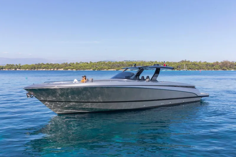 Slide: The Image of 2026 Canados 493 Grand yacht cruising on clear blue water. - 3