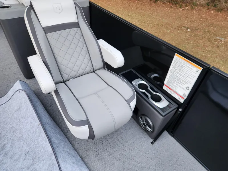 Slide: The Image of Luxury seating on 2025 Godfrey AquaPatio Sundeck 275 SDC with cup holders and speaker. - 7