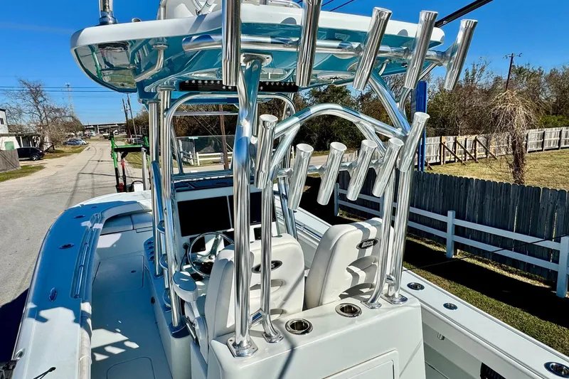Slide: The Image of 2021 Costa Custom Boats 264 HC with sleek design and advanced fishing rod holders. - 10