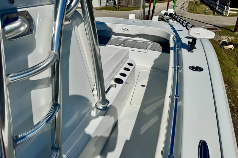 Slide: The Image of 2021 Costa Custom Boats 264 HC, sleek deck design with stainless steel railings. - 17