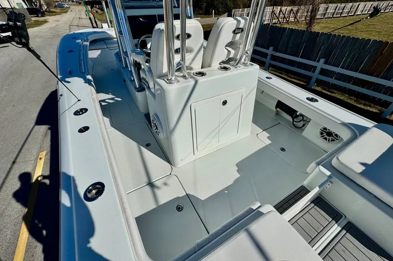 Slide: The Image of 2021 Costa Custom Boats 264 HC interior with seating and storage compartments. - 9