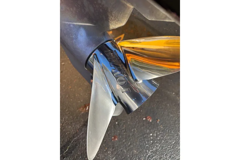 Slide: The Image of Close-up of a polished propeller on a 2007 Eliminator Daytona 30 boat. - 36