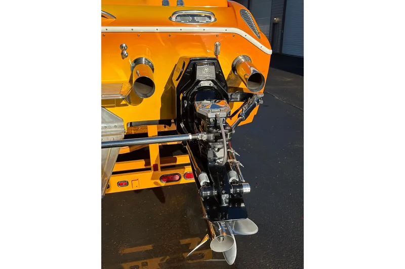 Slide: The Image of Rear view of 2007 Eliminator Daytona 30 boat with dual exhaust and propeller. - 46