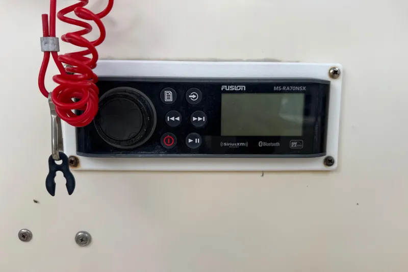 Slide: The Image of Fusion MS-RA70NSX stereo system on 2001 Parker 2110 Walkaround boat dashboard. - 13