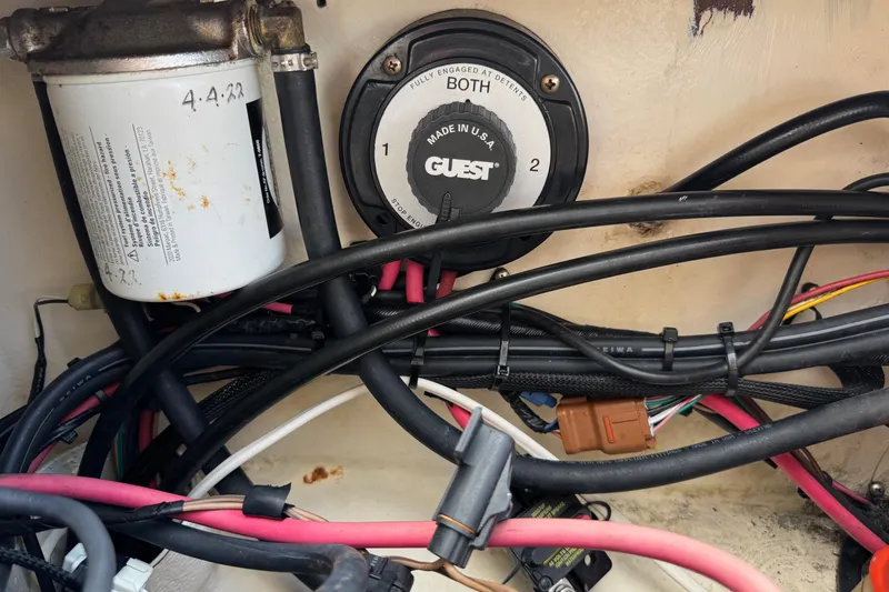 Slide: The Image of Boat wiring and battery switch in a 2001 Parker 2110 Walkaround. - 24