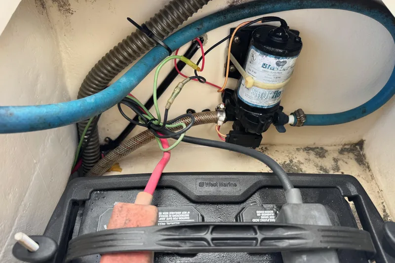 Slide: The Image of Battery and wiring setup in a 2001 Parker 2110 Walkaround boat. - 26