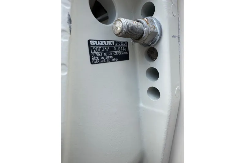 Slide: The Image of Close-up of Suzuki motor label on 2001 Parker 2110 Walkaround boat. - 30