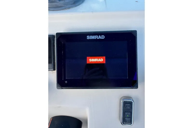 Slide: The Image of Simrad display on 2001 Parker 2110 Walkaround boat dashboard. - 7