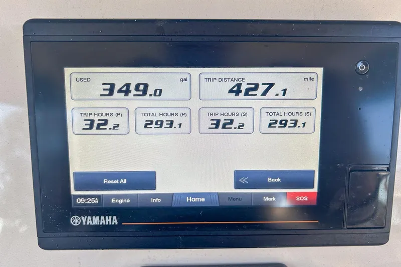 Slide: The Image of Yamaha display showing fuel usage and trip data for 2021 Grady-White Freedom 325 boat. - 5