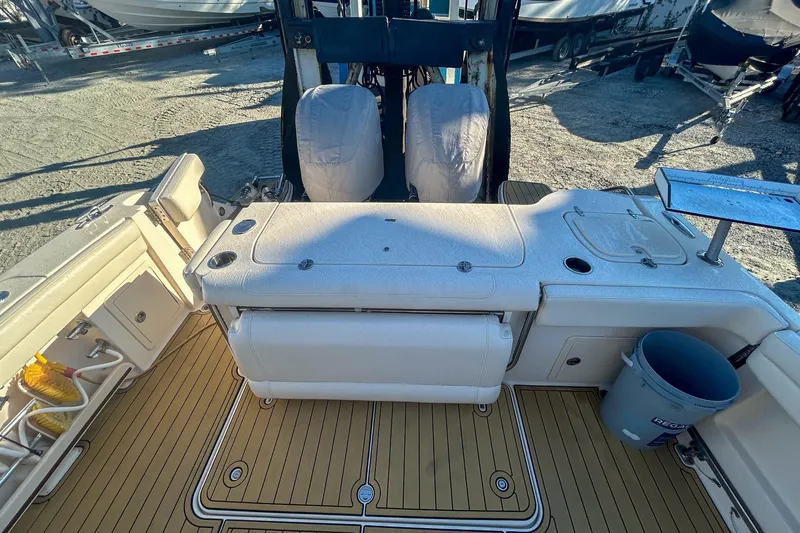 Slide: The Image of 2021 Grady-White Freedom 325 boat interior with seating and deck features. - 7