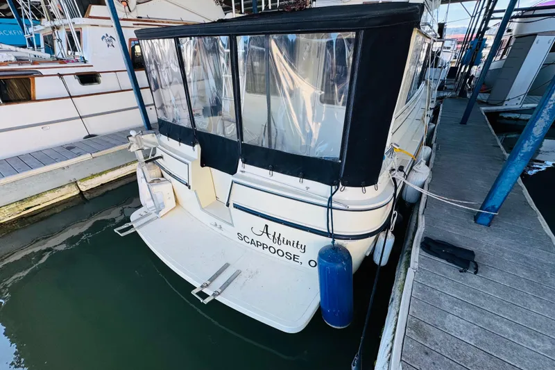 Slide: The Image of 2004 Camano 31 Troll boat docked, featuring covered deck and fender, Scappoose, Oregon. - 23