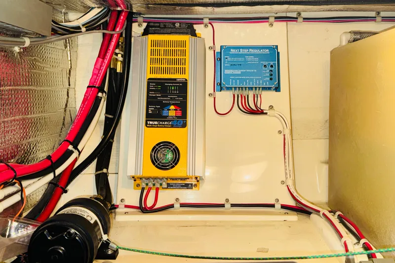 Slide: The Image of Electrical system of a 2004 Camano 31 Troll boat, featuring a TrueCharge 40+ charger. - 42