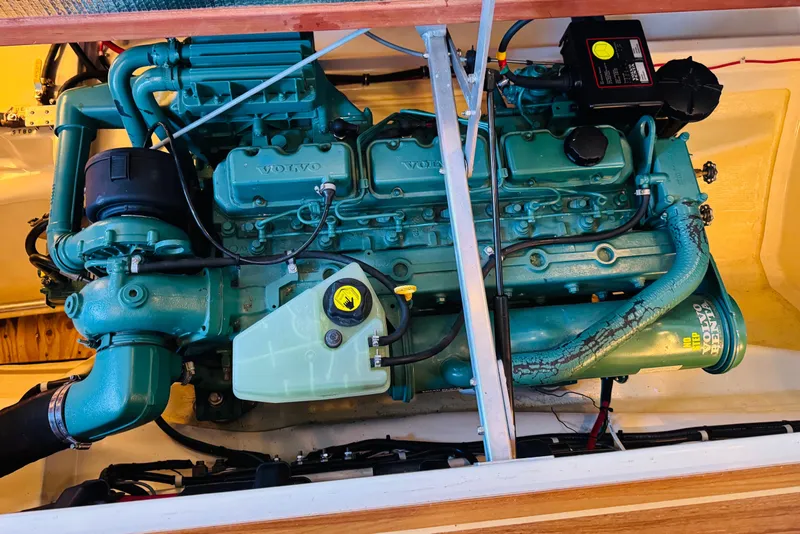 Slide: The Image of 2004 Camano 31 Troll engine compartment with Volvo Penta marine engine. - 49