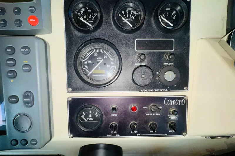 Slide: The Image of Control panel of a 2004 Camano 31 Troll boat with Volvo Penta gauges. - 54