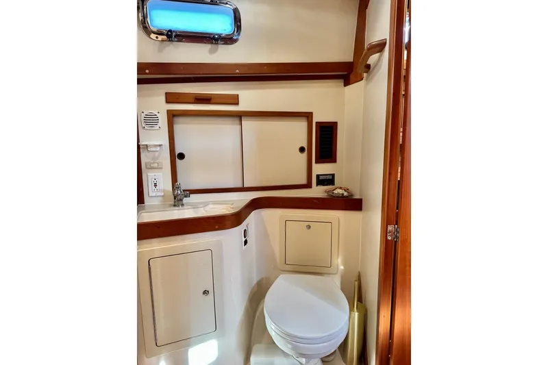 Slide: The Image of 2001 Sabre Sedan Bridge bathroom with wooden accents and compact design. - 42