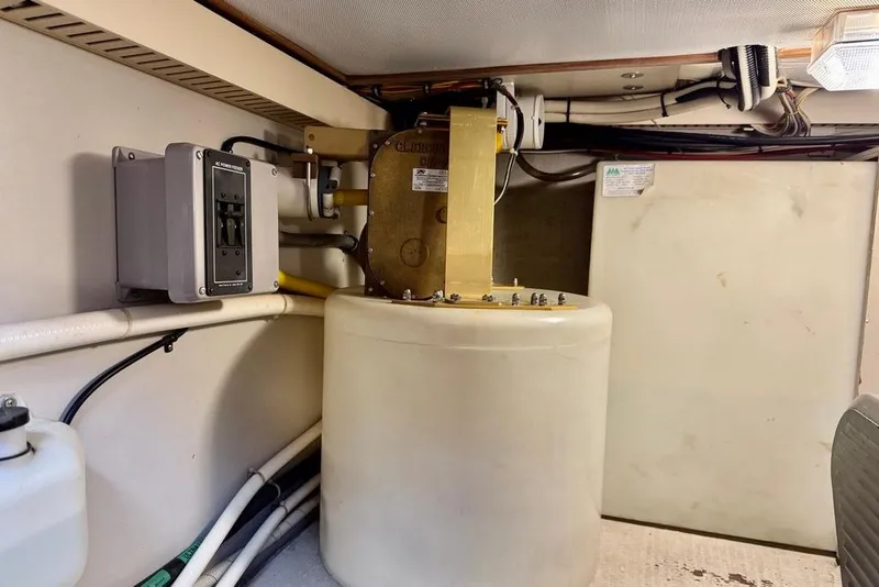 Slide: The Image of 2001 Sabre Sedan Bridge engine room with electrical panel and equipment. - 54