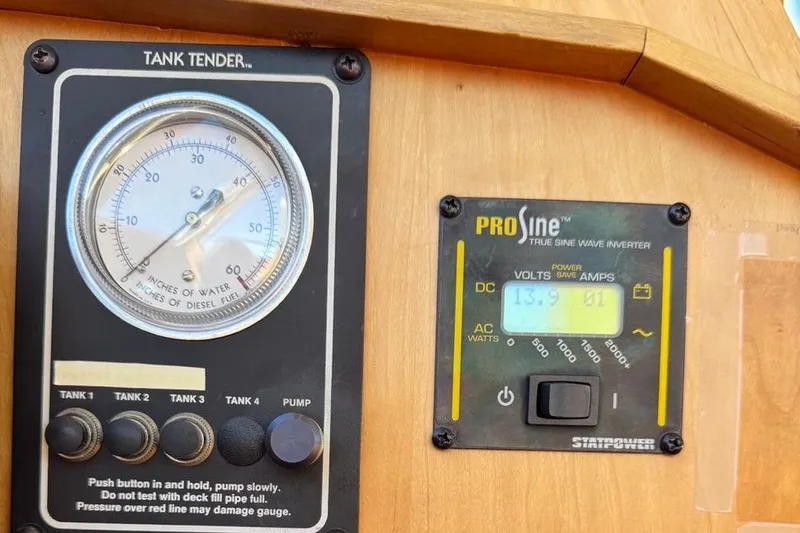 Slide: The Image of Tank tender and ProSine inverter display on 2001 Sabre Sedan Bridge. - 63