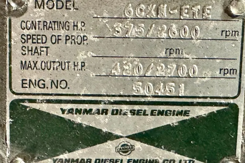 Slide: The Image of Yanmar diesel engine plate with specifications for Sabre Sedan Bridge 2001 model. - 66