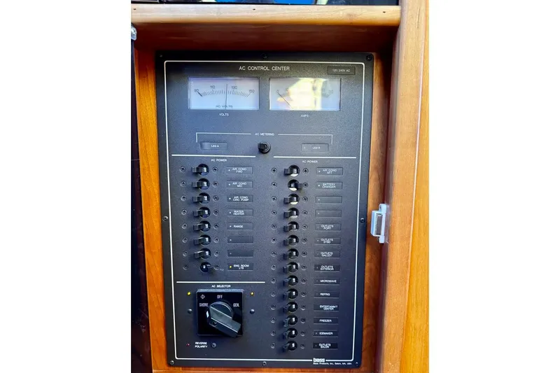 Slide: The Image of Electrical control panel on a 2001 Sabre Sedan Bridge boat. - 69