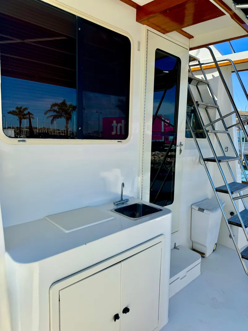 Slide: The Image of 2001 Sabre Sedan Bridge with outdoor sink and stairs. - 7